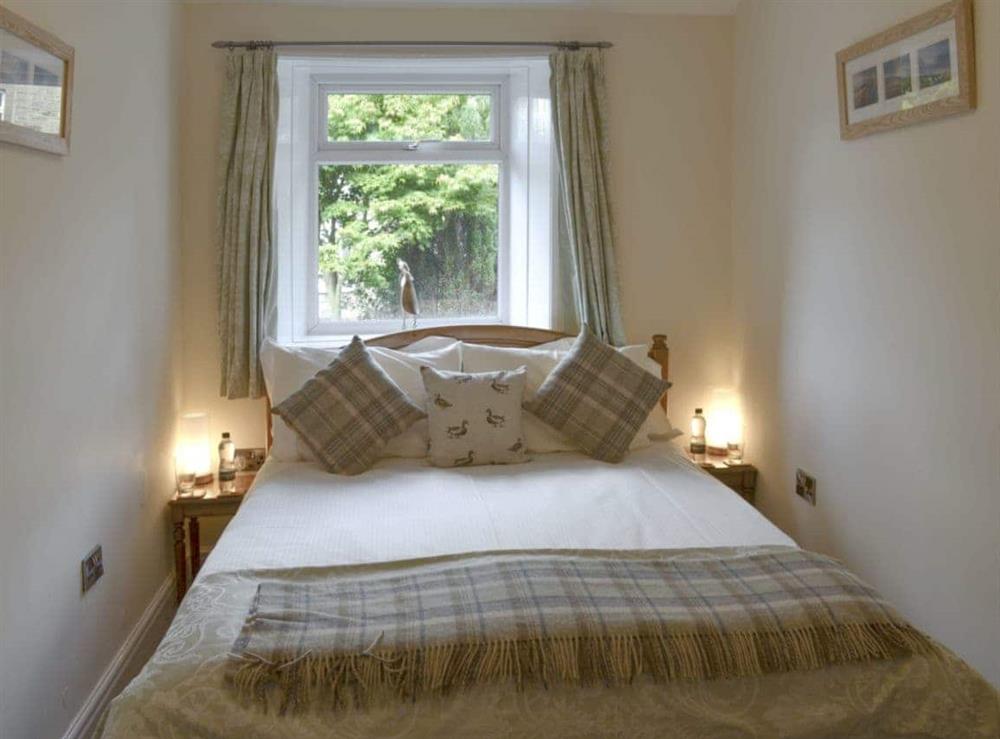Relaxing double bedroom at Shelduck Cottage in Holmfirth, West Yorkshire