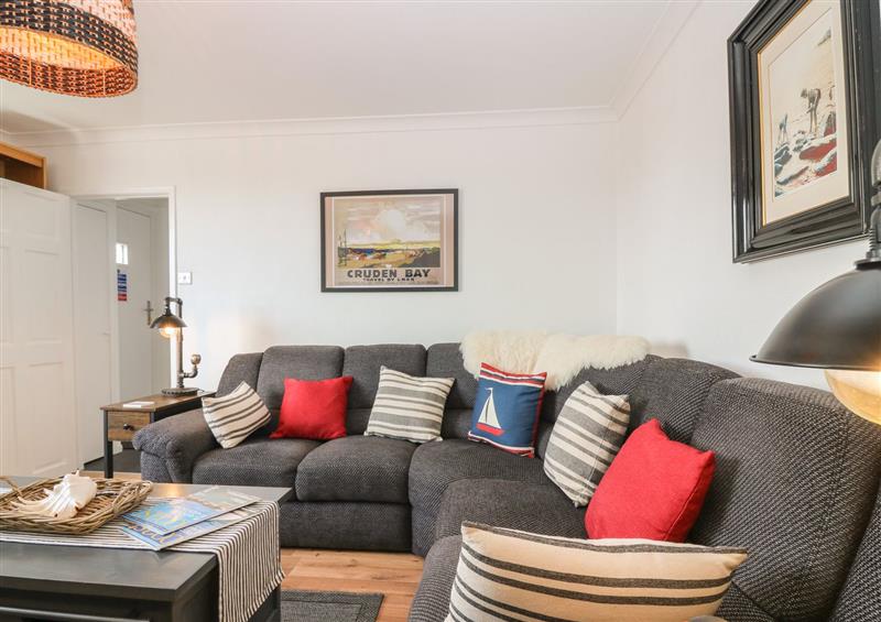 Relax in the living area at Shell Cottage, Cruden Bay