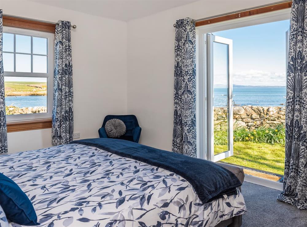 Double bedroom at Shell Cottage in Portyerrock, near Newton Stewart, Wigtownshire