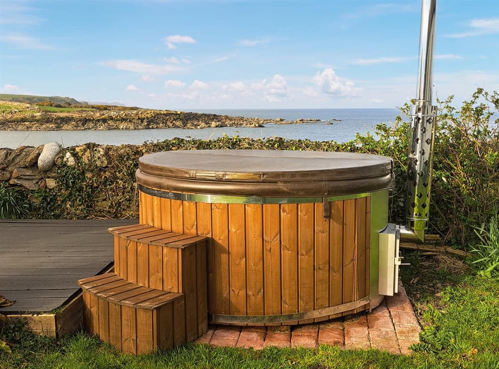 Hot tub (photo 2) at Shell Cottage in Portyerrock, near Newton Stewart, Wigtownshire