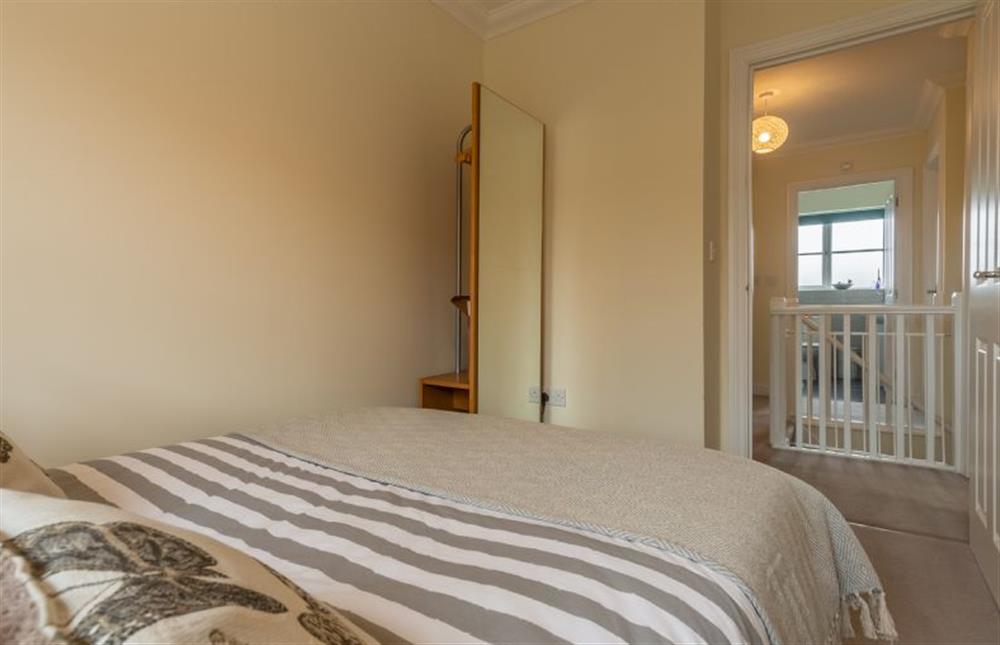 First floor: A cosy double bedroom at Shellseekers, Snettisham near Kings Lynn