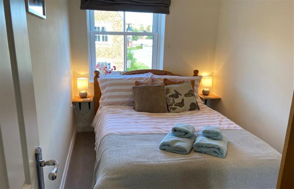 First Floor: Bedroom three with a double bed at Shellseekers, Snettisham near Kings Lynn