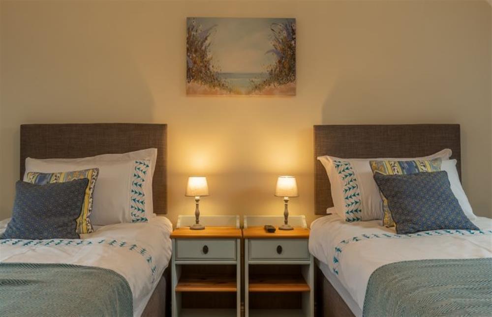 First floor: Bedroom two with a super-king size zip-and-link bed showing twin option at Shellseekers, Snettisham near Kings Lynn
