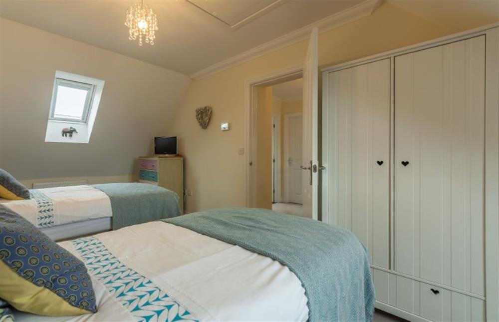 First floor: Bedroom two with television at Shellseekers, Snettisham near Kings Lynn