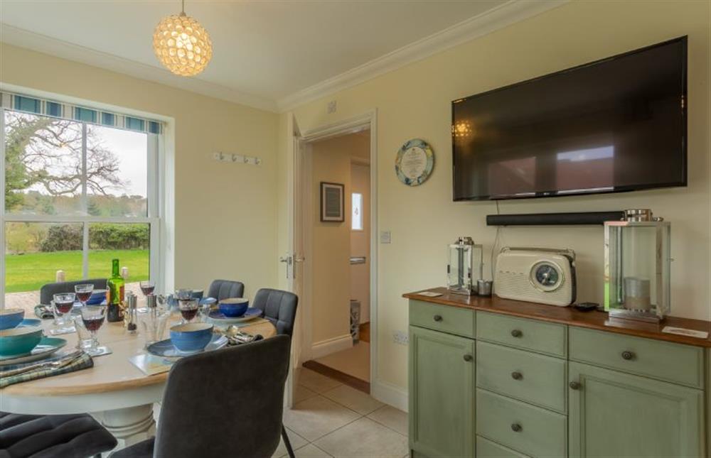 Ground floor: Kitchen view to the green in front of the house at Shellseekers, Snettisham near Kings Lynn
