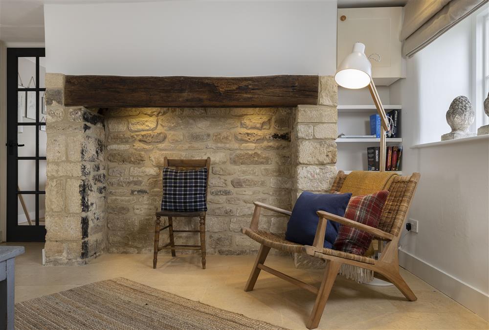 Ground floor: Entrance hall with a Snug seating area at Shepherds Cottage, Chipping Norton