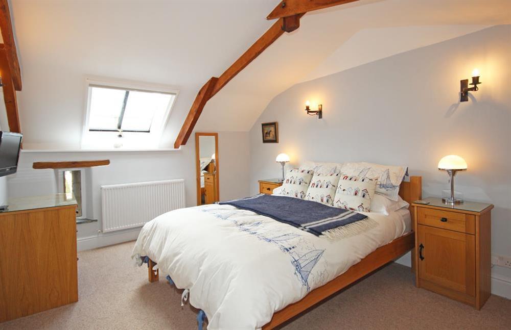 En suite master bedroom with King size bed (photo 2) at Shepherds Cottage in Goveton, Nr Kingsbridge