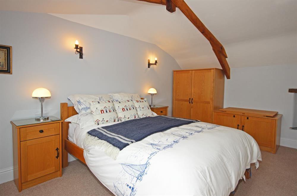 En suite master bedroom with King size bed at Shepherds Cottage in Goveton, Nr Kingsbridge