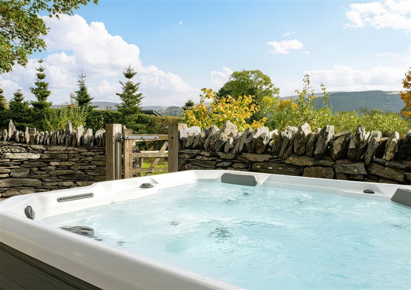 There is a hot tub at Shepherds Cottage, Llandrillo