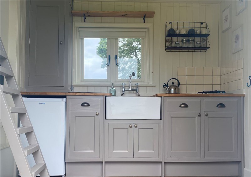 This is the kitchen at Shepherds Hut 2, Northchapel