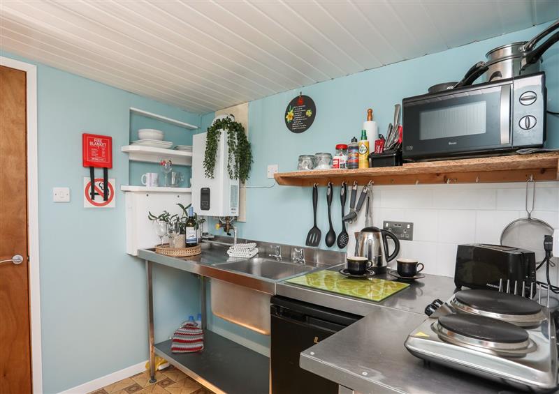 This is the kitchen (photo 2) at Shepherds Hut - Carnguwch, Llithfaen