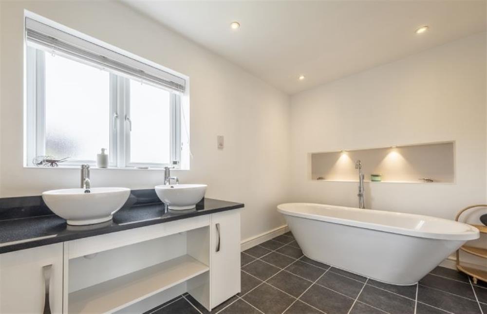 Bathroom with freestanding roll top bath at Sherborne House, Wells-next-the-Sea