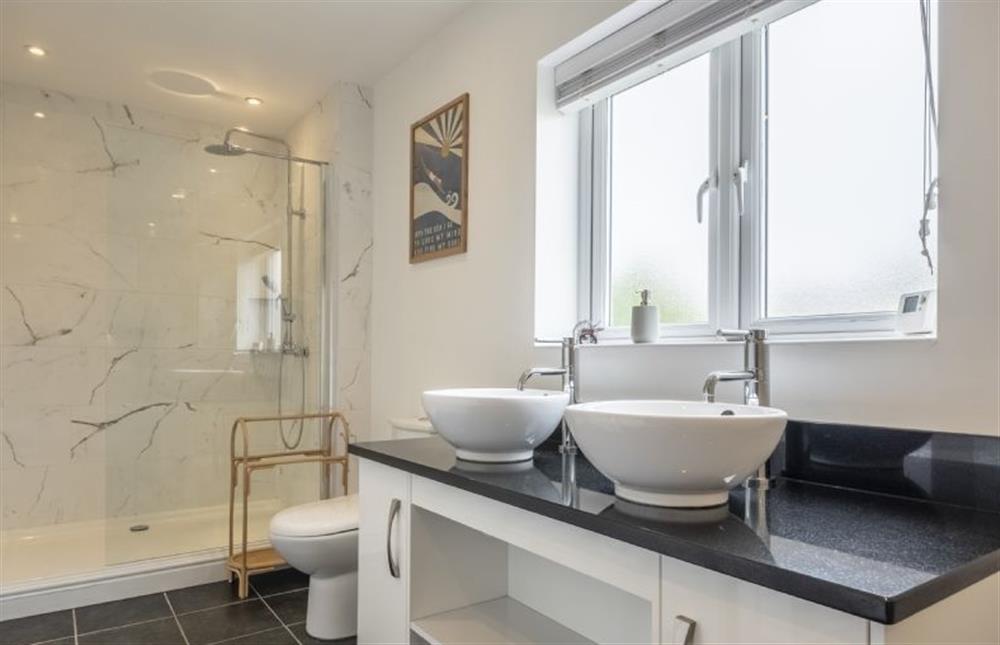Bathroom with twin wash basins and large walk-in shower at Sherborne House, Wells-next-the-Sea