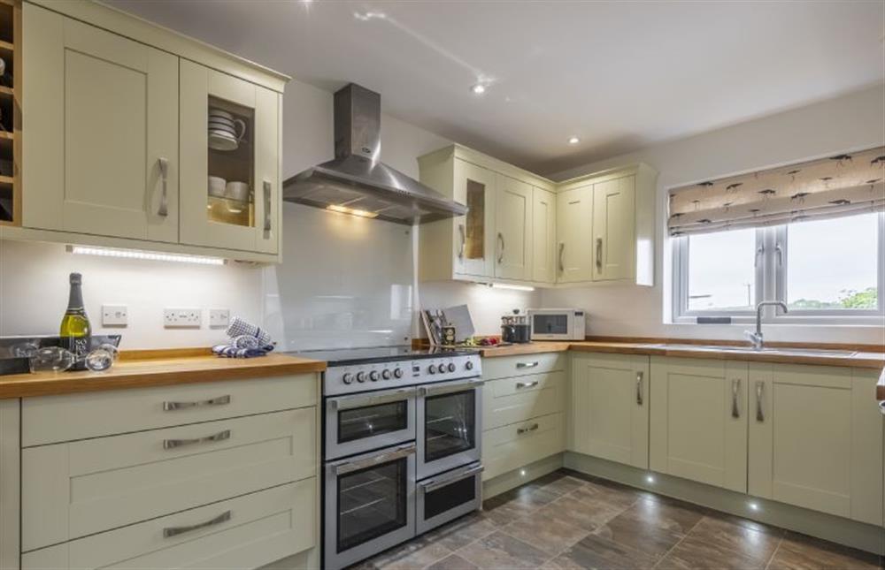 Kitchen with electric range cooker at Sherborne House, Wells-next-the-Sea