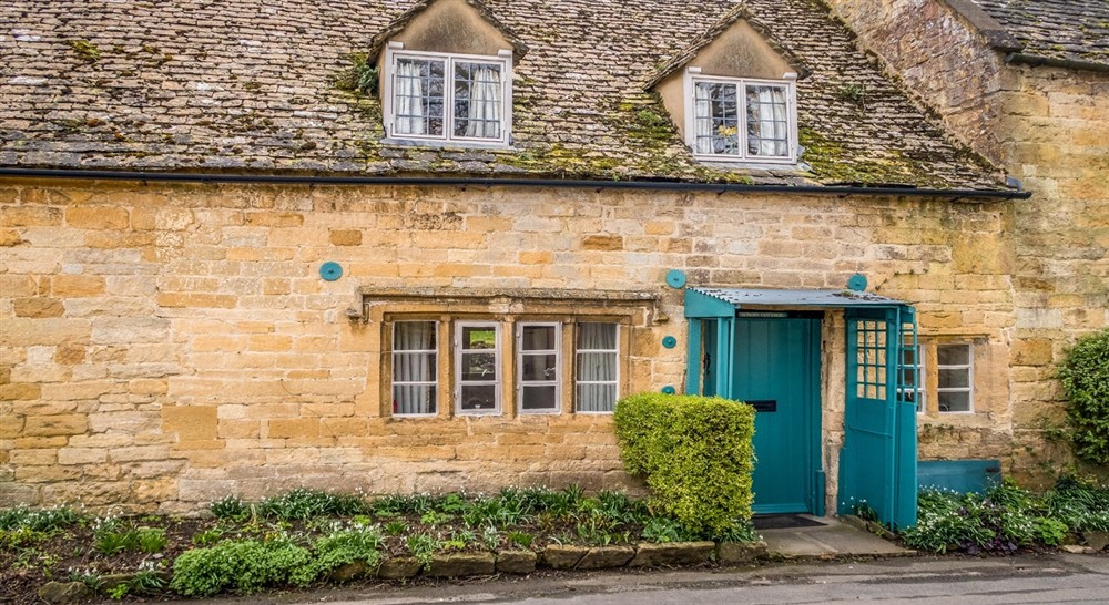 The exterior of Honors Cottage, Snowshill, nr Broadway, Gloucestershire at Sherborne West Lodge in Sherborne, Gloucestershire