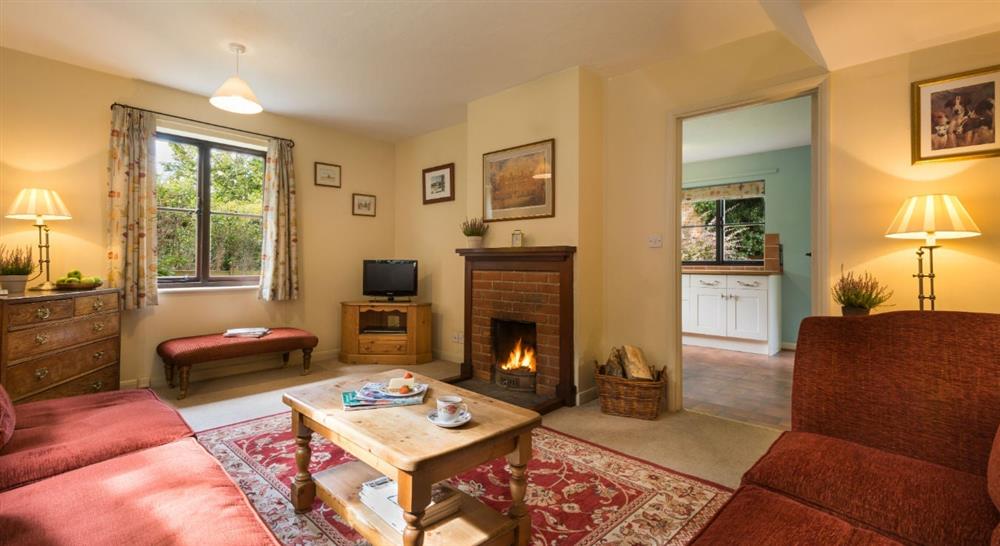 The cosy sitting room at Sheringham Wood Farm in Upper Sheringham, Norfolk