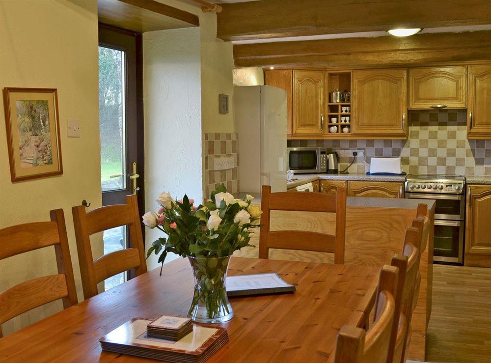 Delightful dining area with door leading to garden at Rosemary, 