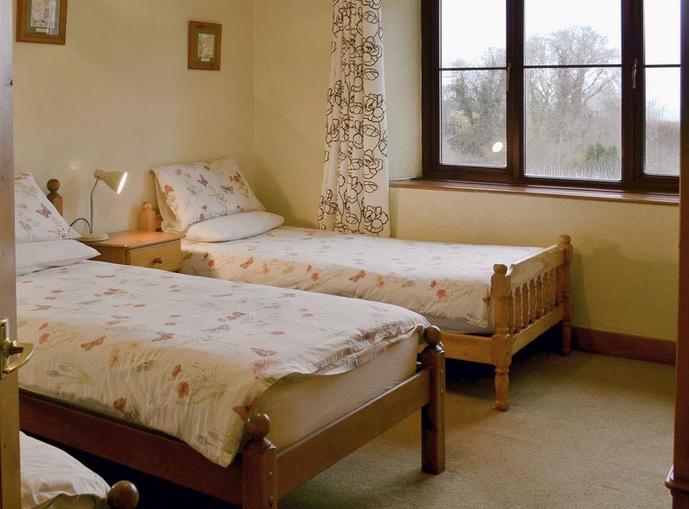 Single beds in bedroom 1 at Sherrill Farmhouse, 