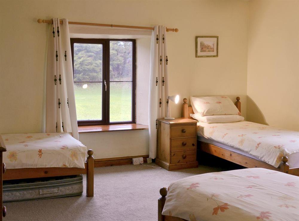 Spacious bedroom with multiple beds at Sherrill Farmhouse, 