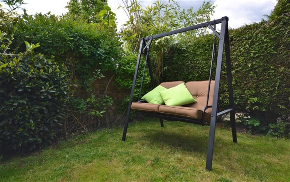 Swing seat at Sherston Cottage in Lymington