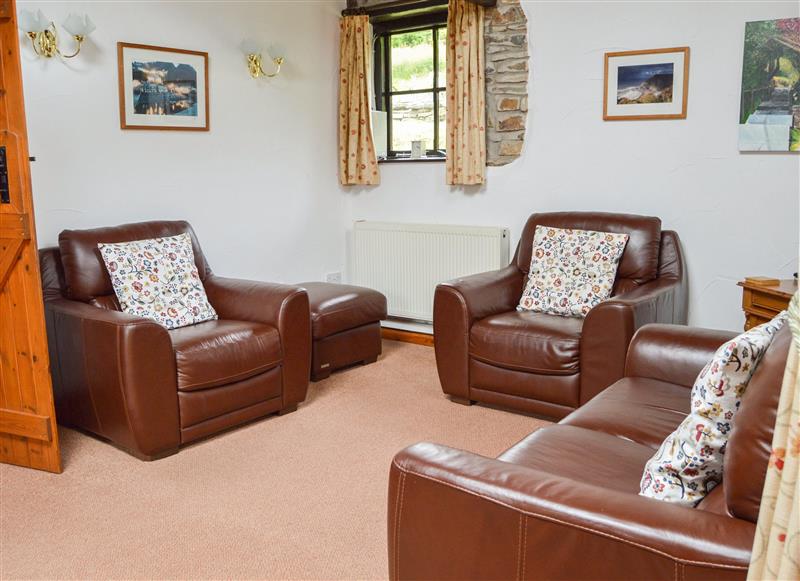 Relax in the living area at Shipload Cottage, Hartland