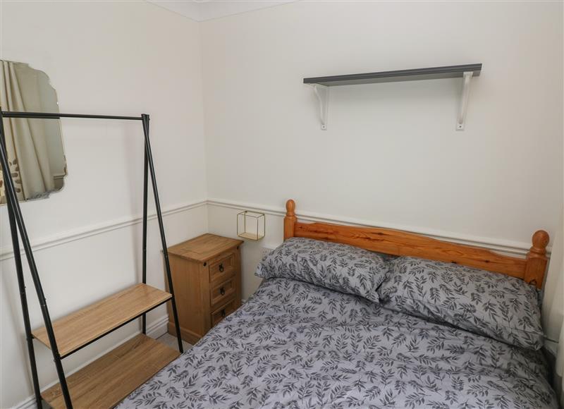 A bedroom in Shipwreck Chalet at Shipwreck Chalet, Kidwelly