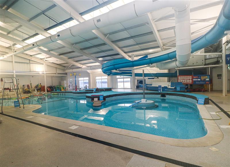Enjoy the swimming pool at Shipwreck Chalet, Kidwelly
