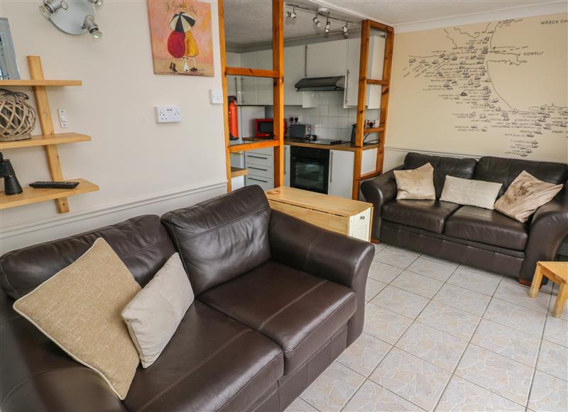 Relax in the living area at Shipwreck Chalet, Kidwelly