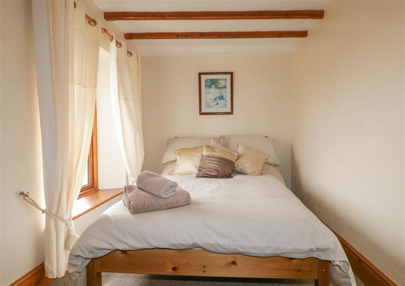A bedroom in Shipwreck Cottage (photo 3) at Shipwreck Cottage, Haverigg