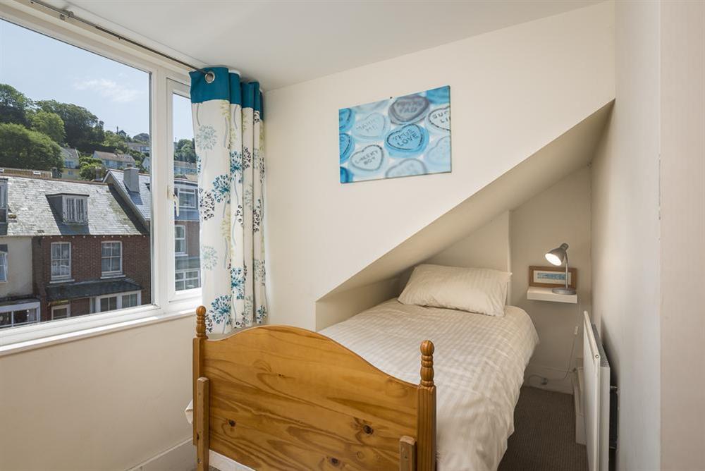 2nd floor (attic) level is a small twin bedroom with two single beds (photo 2) at Shipwrights in 11 Coronation Road, Salcombe