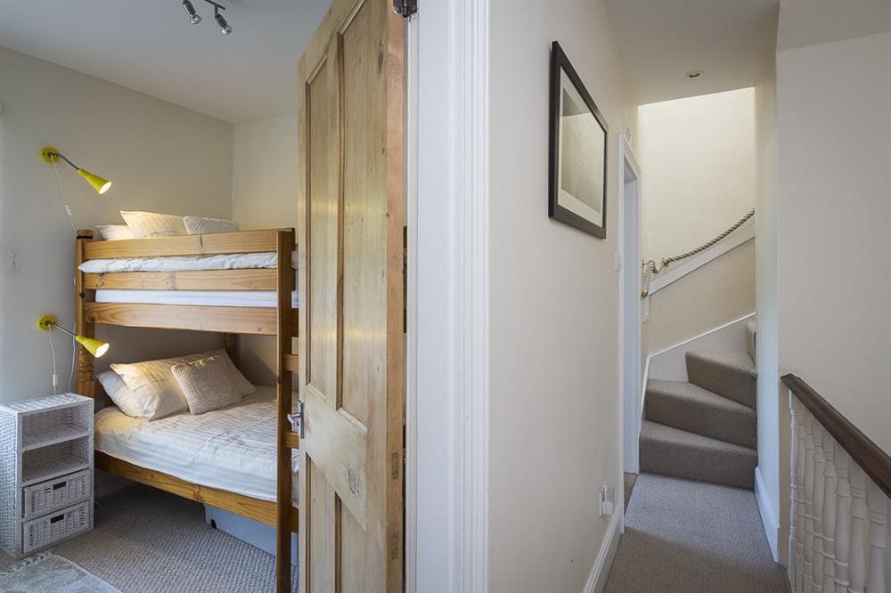 Bunk room with stairs to 2nd floor at Shipwrights in 11 Coronation Road, Salcombe