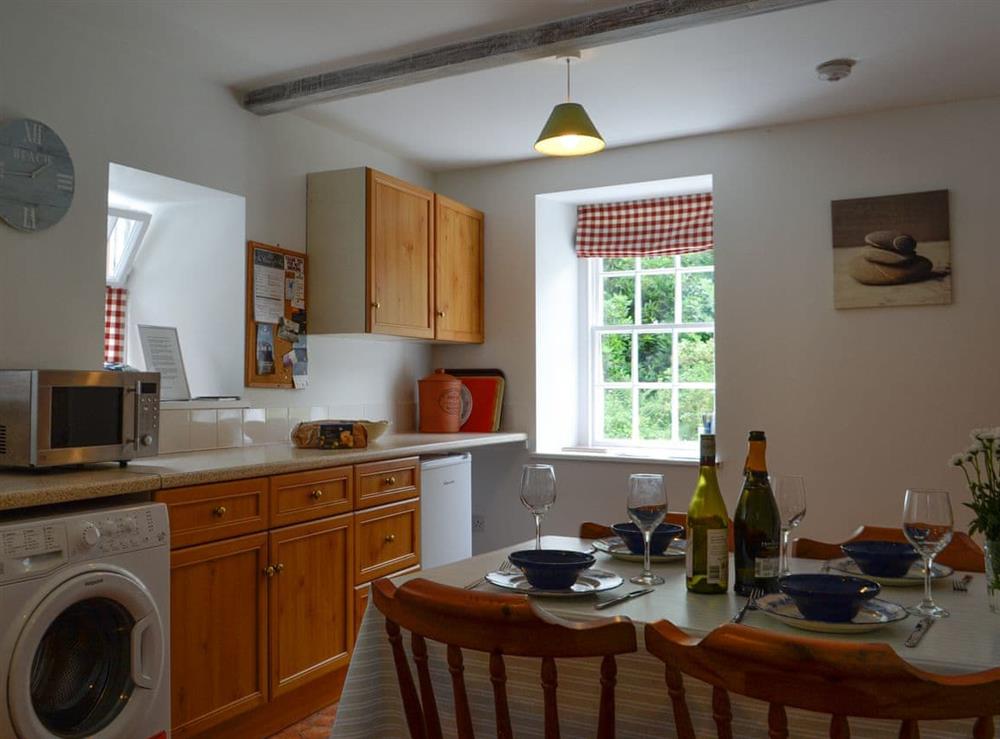 Kitchen with dining area (photo 2) at Shore Cottage in Garlieston, near Newton Stewart, Wigtownshire