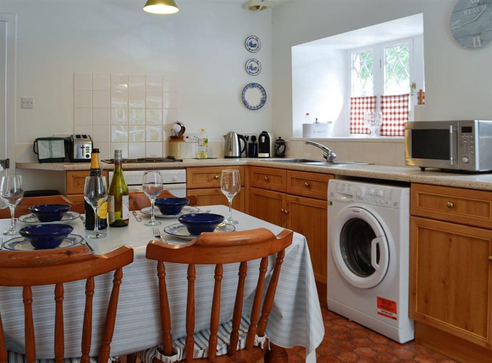 Kitchen with dining area at Shore Cottage in Garlieston, near Newton Stewart, Wigtownshire