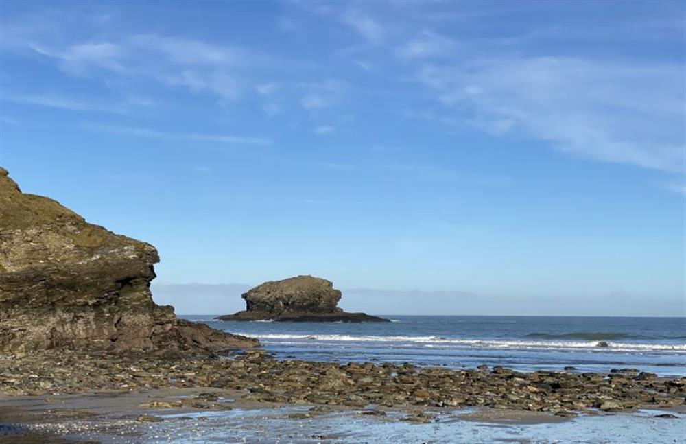 Gull Rock in the distance of Portreath beach at Shore Edge, Portreath