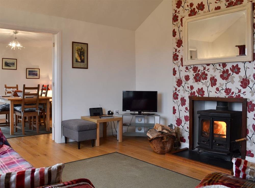 Living room with wood burner at Shore Meadow in Silecroft, near Millom, Cumbria