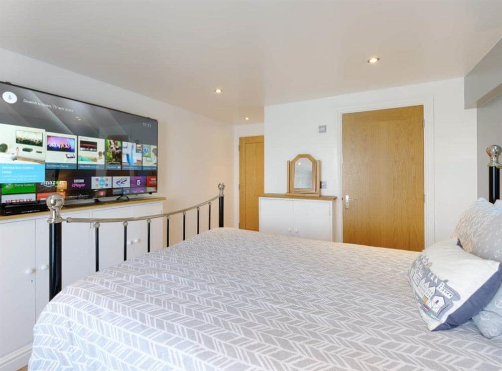 Comfortable double bedroom with large entertaining tv at Shoreline in Appledore, Devon