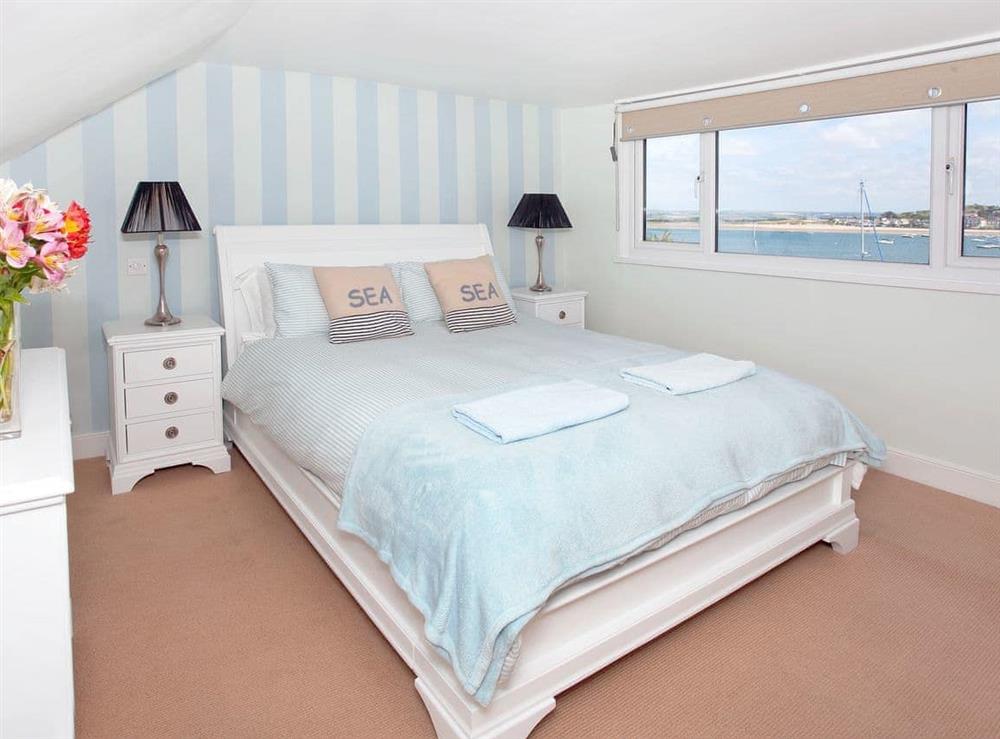 King size double bed with stunning views over the estuary at Shorewaters in Appledore, near Bideford, Devon