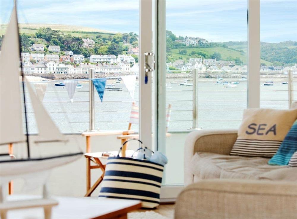 Living room with view of the estuary at Shorewaters in Appledore, near Bideford, Devon