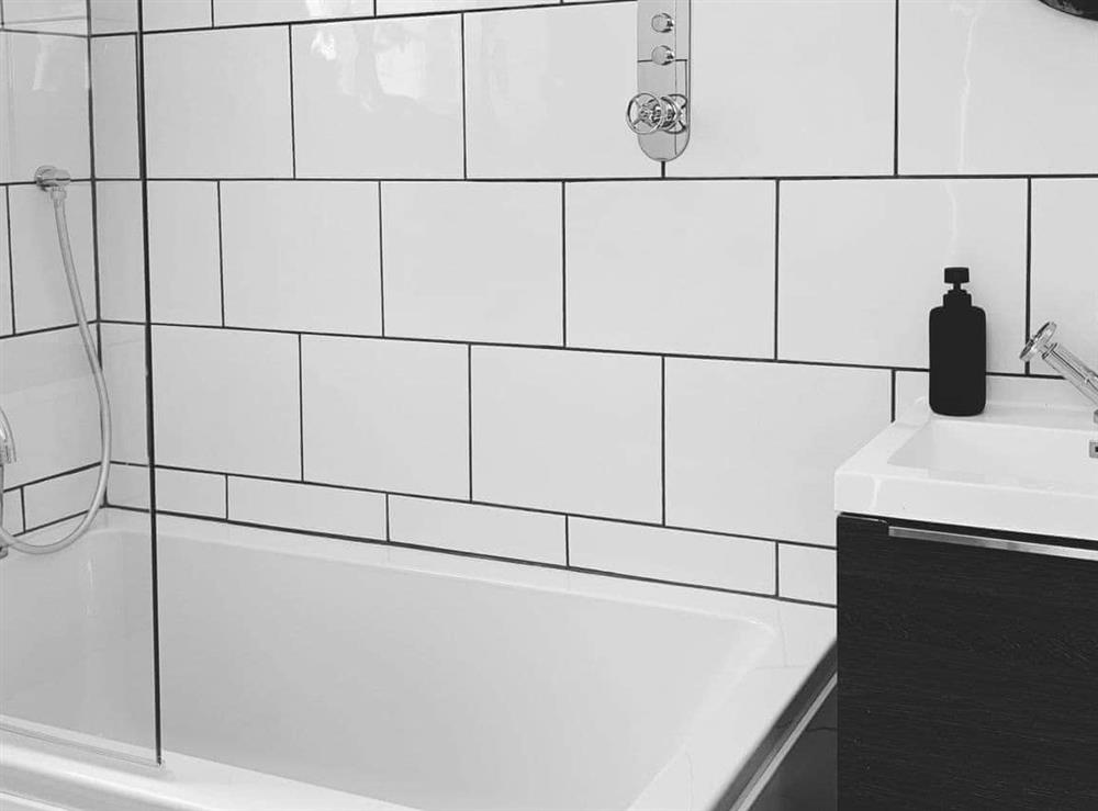 Modern white bathroom suite with shower at Shorewaters in Appledore, near Bideford, Devon