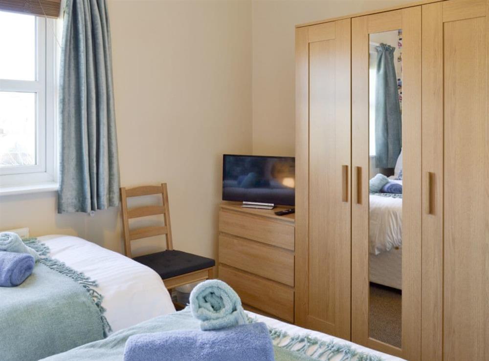 Ample storage within twin bedroom at Signals Court in Scarborough, North Yorkshire