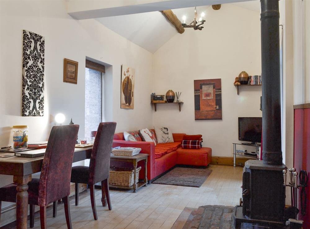 Spacious living and dining room at Silk Hill Stables in High Peak, Derbyshire