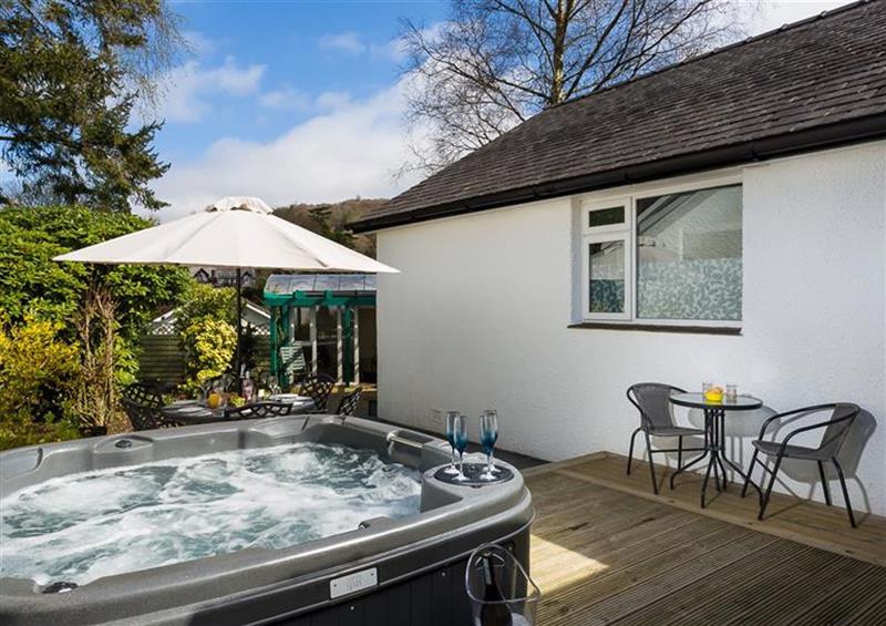 There is a hot tub at Silver Birches, Windermere