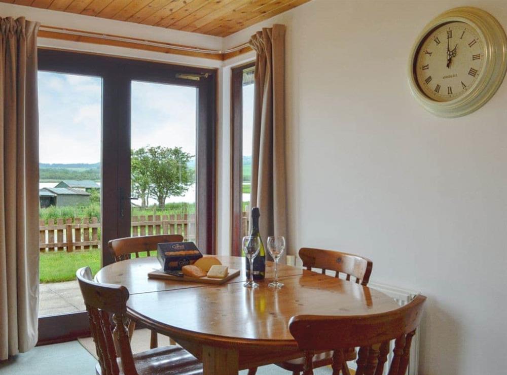 Dining area with Loch views at Silver Dee in Crossmichael, near Castle Douglas, Dumfries and Galloway, Kirkcudbrightshire