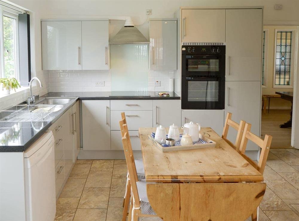 Convenient dining area within kitchen at Silverdale in Bacton, near Happisburgh, Norfolk