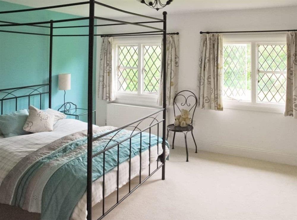 Four Poster bedroom at Silverland in Hordle, near Lymington, Hampshire