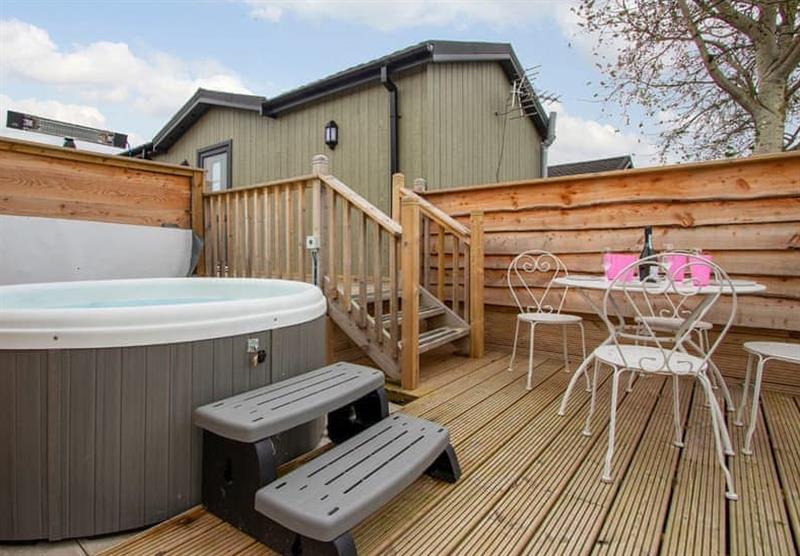 Hot tub outside Hideaway Lodge at Silverwood in Perth, Perthshire