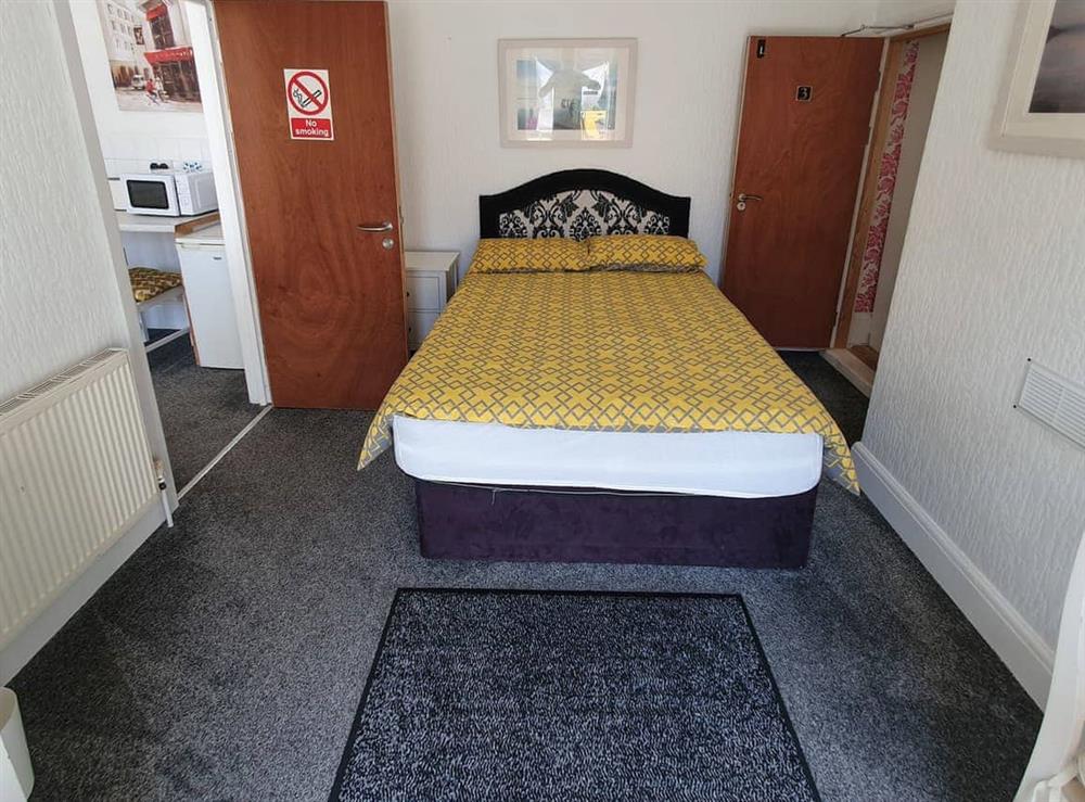 Sleeping area at Singer House Apartment in Paignton, Devon