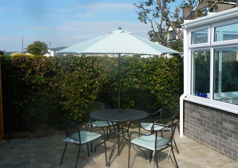 Enjoy a cup of tea on the patio at Sisial y Llyn, Bala