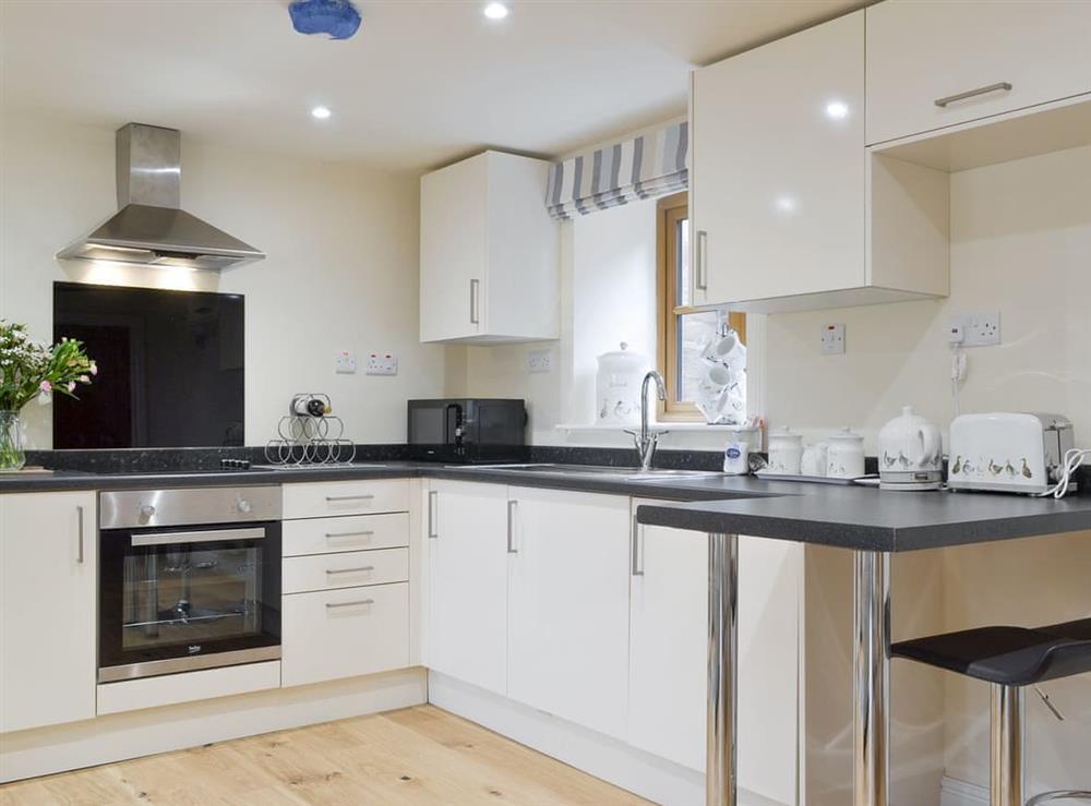 Well-equipped fitted kitchen at No. 1 Ash Cottage, 