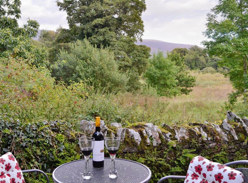 Lovely rural views from the outdoor seating area at Skelmorlie Cottage in Portinscale, near Keswick, Cumbria